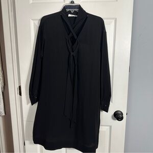 Diane Von Furstenberg size M black silk shirt dress, tie neck detail, unlined